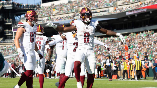 Washington Commanders running back Brian Robinson Jr. (8) celebrates his touchdown against the Philadelphia Eagles during the fourth quarter at Lincoln Financial Field.